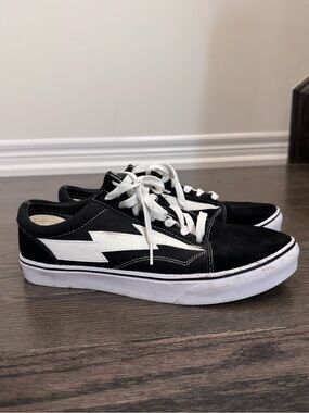 Black Low-Top Sneakers with White Lightning Accent